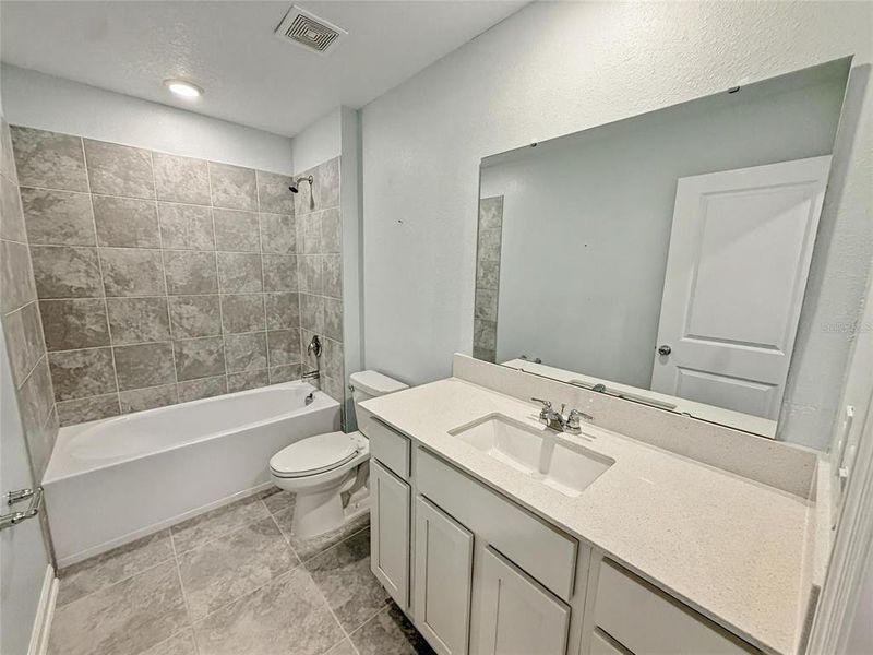 Furnished interior view inside a new home in , Kissimmee (Image 12).