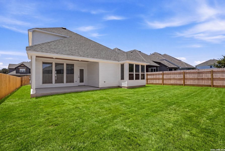 Exterior details and patio area of a home in Bison Ridge, San Antonio (Image 3).