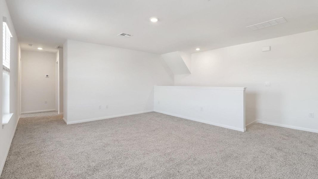 Spacious, unfurnished interior of a new home in Bar W Ranch, Leander (Image 21).
