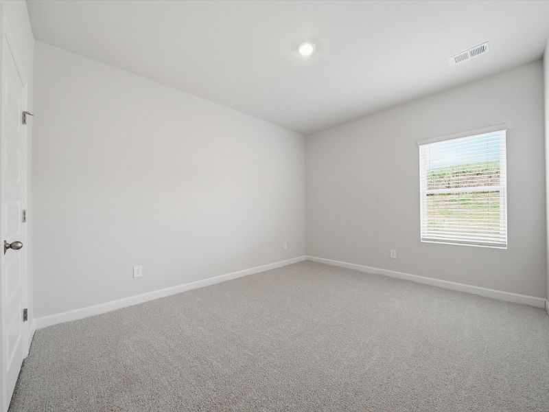 Spacious, unfurnished interior of a new home in The Farm at Wells Creek - Signature Collection, Gray Court (Image 16).
