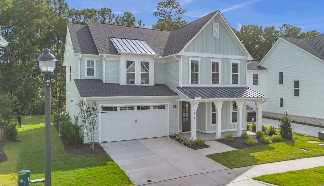 Representative exterior photo of a completed home built from the The Hampton by RobuckHomes in Stonehenge, Raleigh, NC (Image 44).