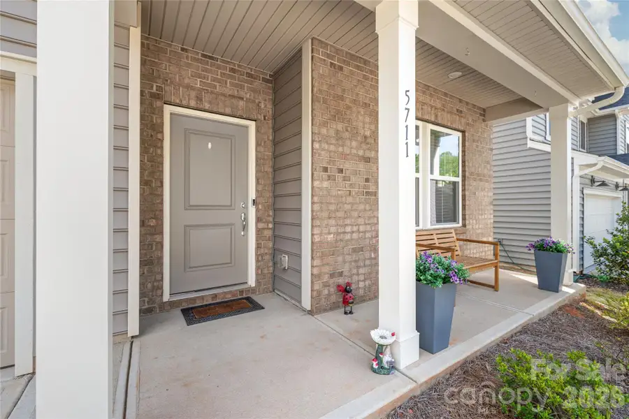 Nice covered porch area to greet your guests
