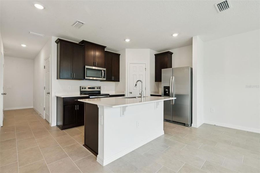 Furnished interior view inside a new home in Cagan Crossings West, Clermont (Image 10).