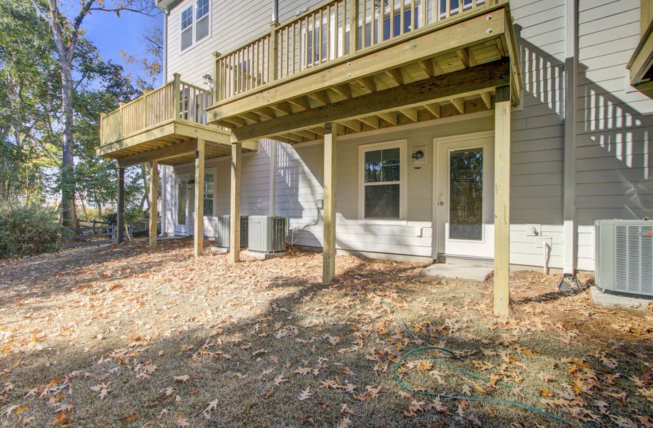 Exterior details and patio area of a home in , Johns Island (Image 23).