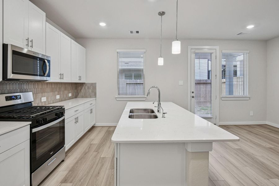 Furnished interior view inside a new home in Spring Brook Village - City Series, Houston (Image 11). Furnished interior view inside a new home in Spring Brook Village - City Series, Houston (Image 11).