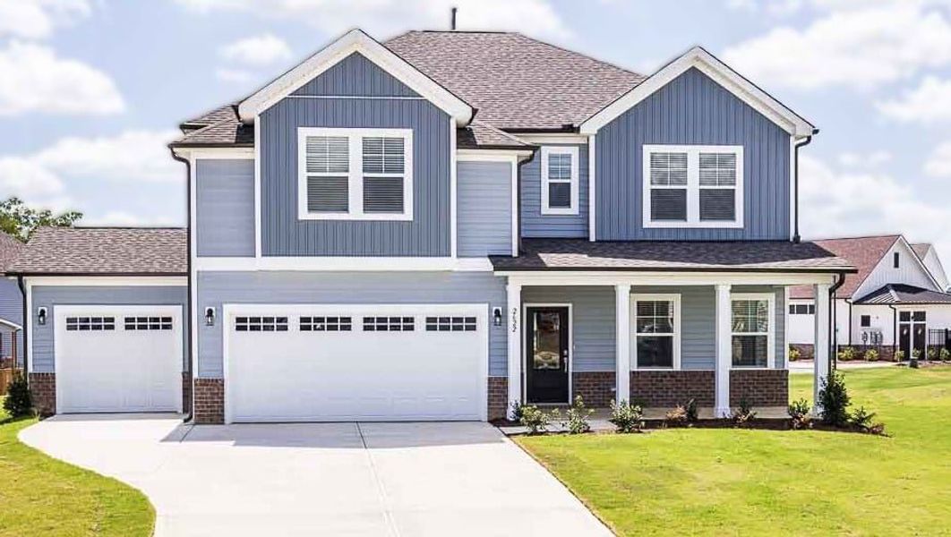 Representative exterior photo of a completed home built from the Bedford by Taylor Morrison in Bridgeberry, Holly Springs, NC (Image 1).
