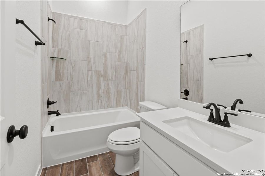 Furnished interior view inside a new home in Stream Waters, Seguin (Image 5).