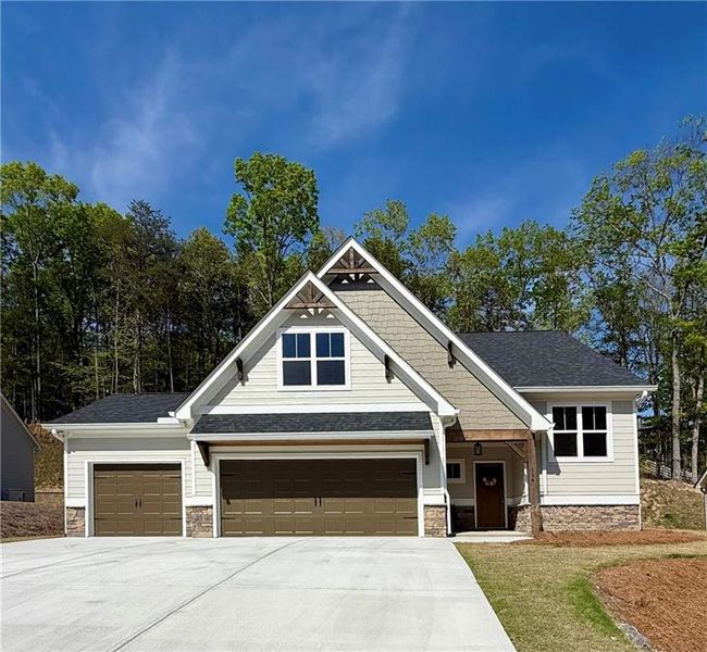 Front exterior of a new home in , Waleska, GA, highlighting curb appeal (Image 1). Front exterior of a new home in , Waleska, GA, highlighting curb appeal (Image 1).