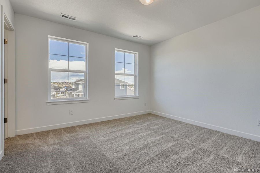 Spacious, unfurnished interior of a new home in Newlin Crossing: The Monarch Collection, Parker (Image 8). Spacious, unfurnished interior of a new home in Newlin Crossing: The Monarch Collection, Parker (Image 8).
