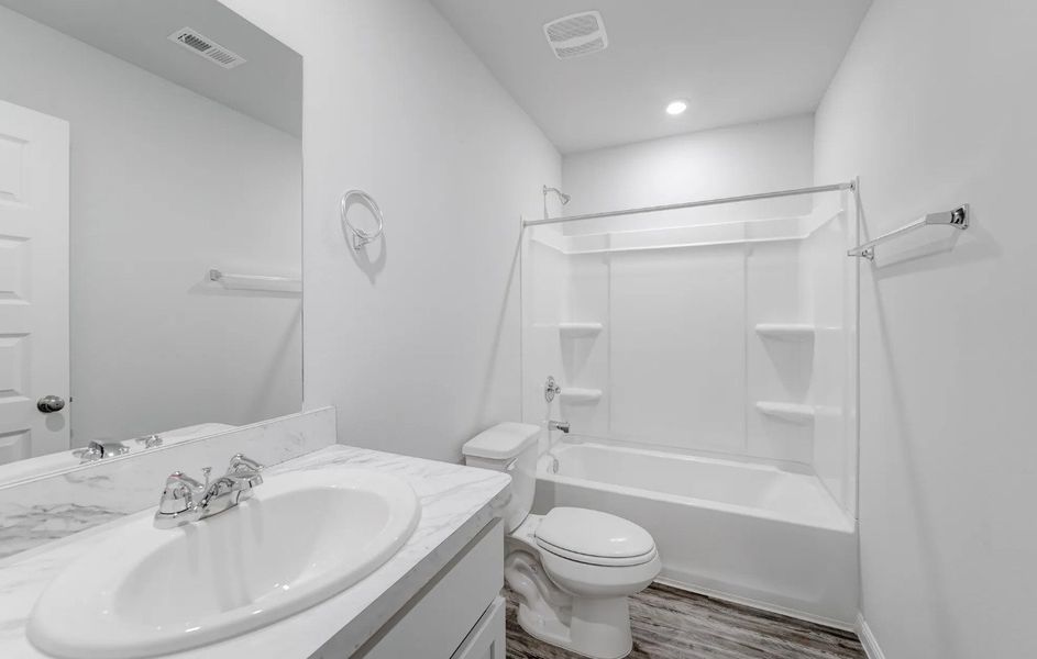 Representative exterior photo of a completed home built from the Biscayne by National HomeCorp in The Park, Uvalde, TX (Image 3).