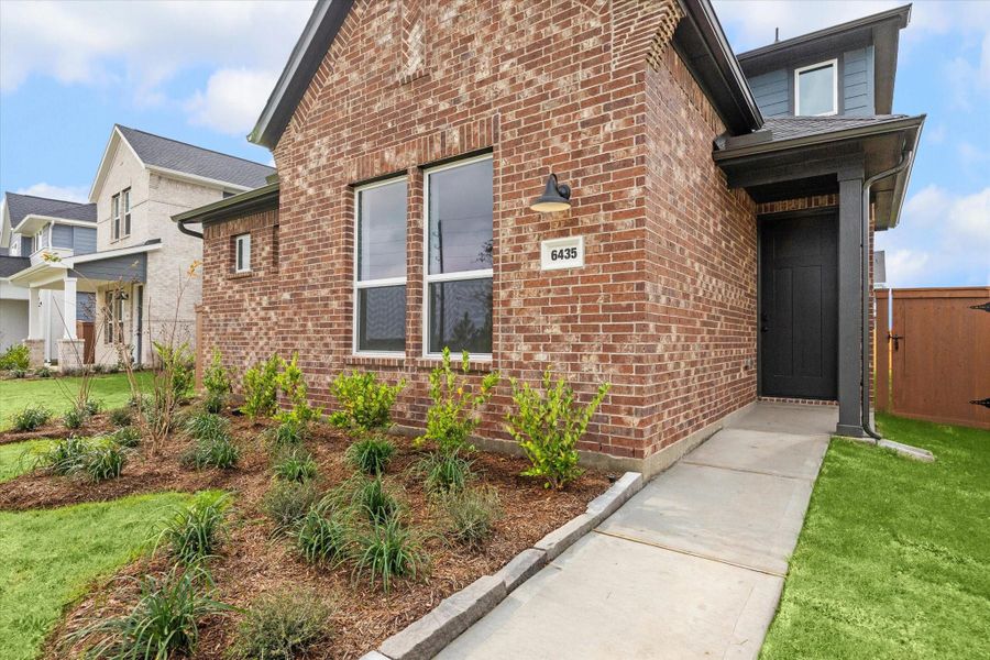 Exterior details and patio area of a home in Elyson, Katy (Image 3).