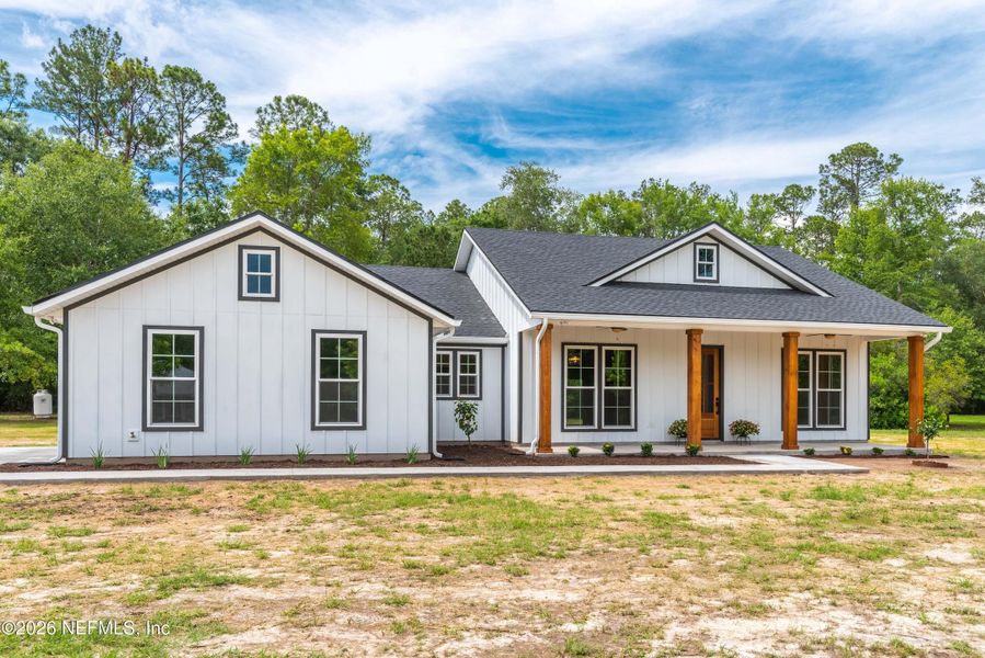 Front exterior of a new home in , Glen St. Mary, FL, highlighting curb appeal (Image 20).