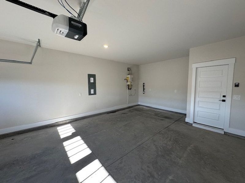 This spacious garage offers ample room for vehicle