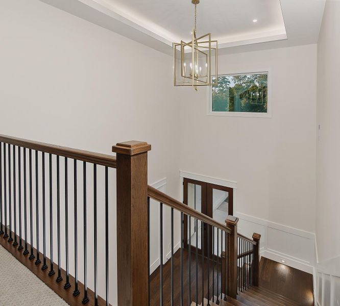 Soaring Ceilings at Rear Entry with Tray Ceiling Details and Accent Lighting Soaring Ceilings at Rear Entry with Tray Ceiling Details and Accent Lighting