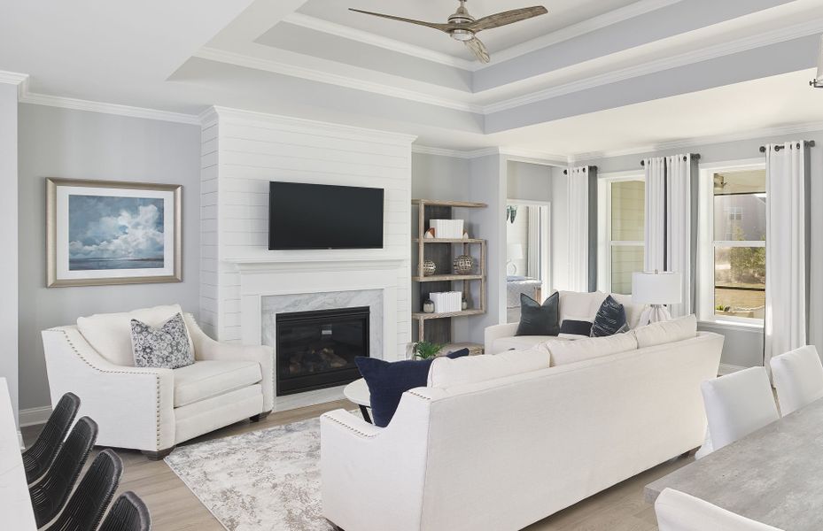 Get cozy near at the optional fireplace in the Gathering Room with a tray ceiling. Get cozy near at the optional fireplace in the Gathering Room with a tray ceiling.