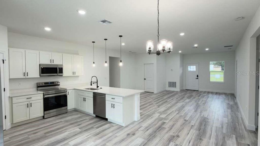 Furnished interior view inside a new home in , Ocala (Image 9).
