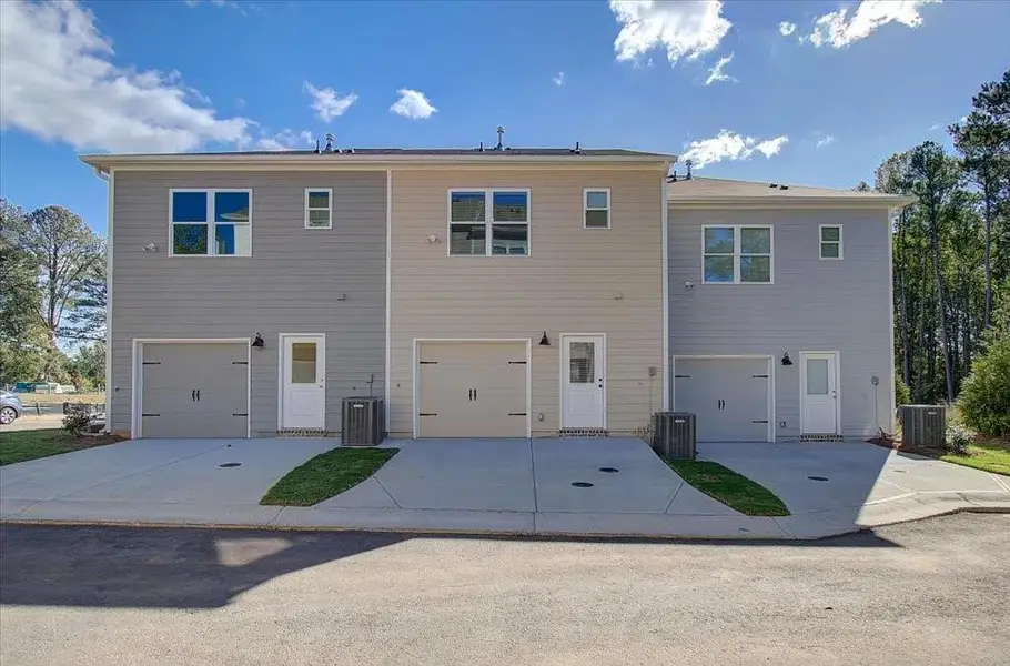 Exterior details and patio area of a home in Wildwood Place, Powder Springs (Image 3).