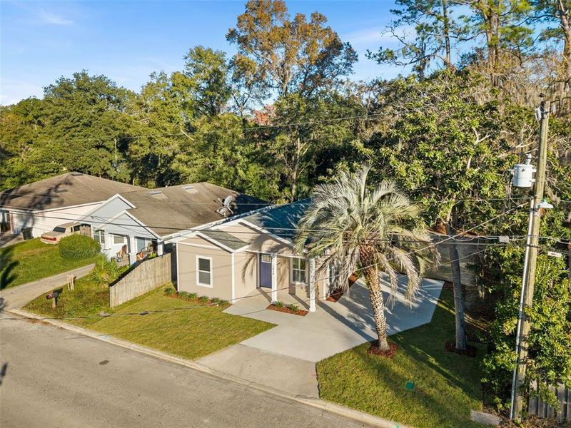 Front exterior of a new home in , Gainesville, FL, highlighting curb appeal (Image 14).