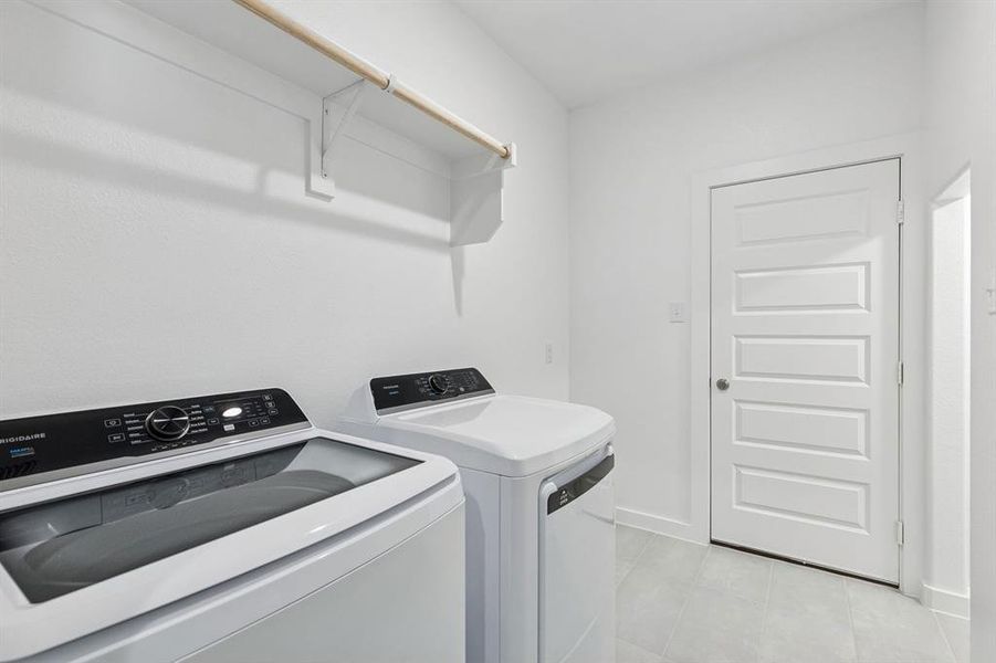 Utility Room in the Holden home plan by Trophy Signature Homes – REPRESENTATIVE PHOTO
