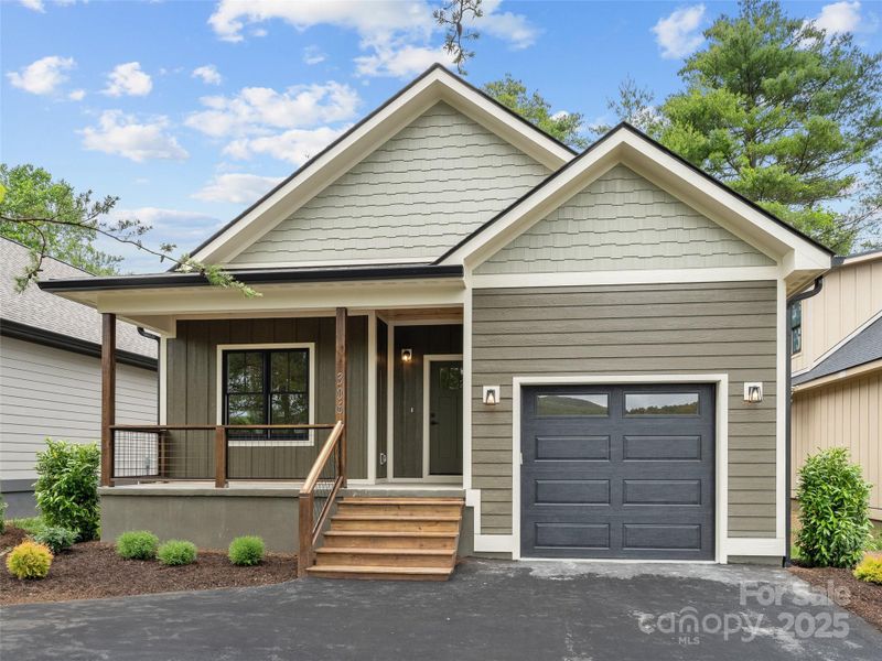 Front exterior of a new home in , Brevard, NC, highlighting curb appeal (Image 19).