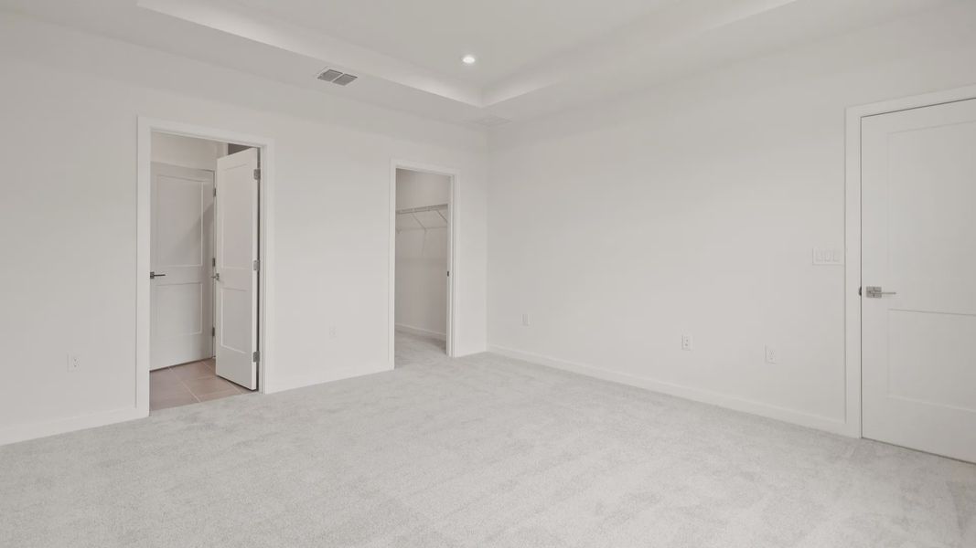 Furnished interior view inside a new home in Grasslands West, Lakeland (Image 21).