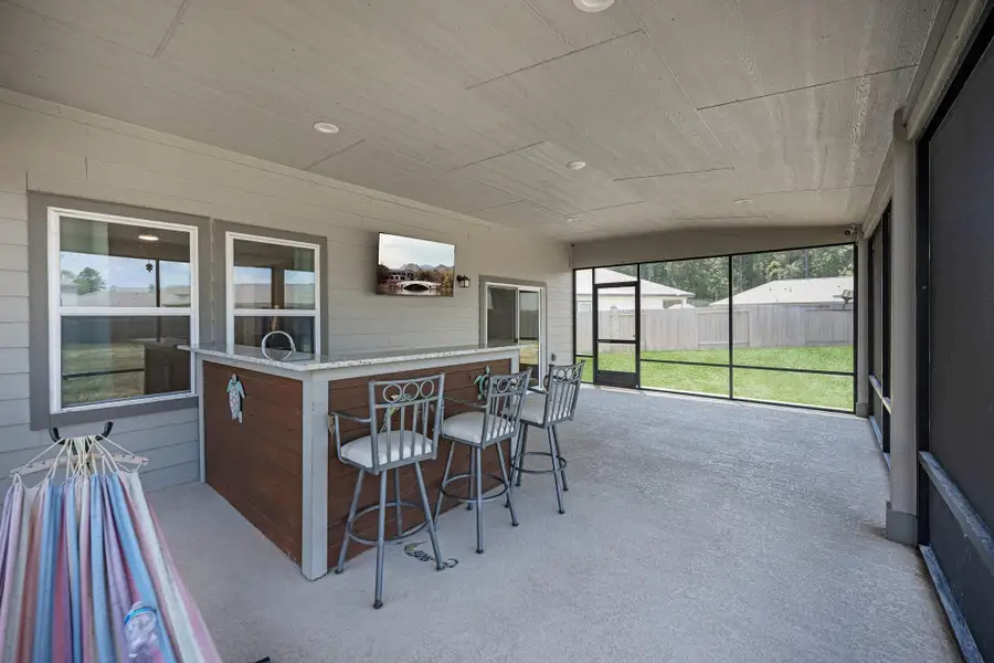 Huge covered patio and entertaining bar