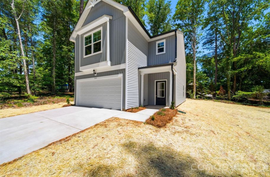 Front exterior of a new home in , Morganton, NC, highlighting curb appeal (Image 1). Front exterior of a new home in , Morganton, NC, highlighting curb appeal (Image 1).