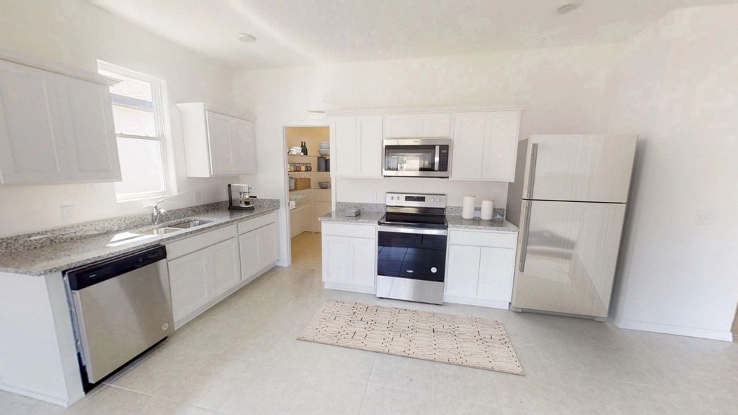 Representative furnished interior of a home built from the Polaris by Starlight Homes in Hawks Run, Kissimmee (Image 4).