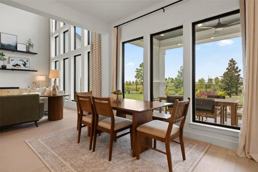 Furnished interior view inside a new home in Bridgeland, Cypress (Image 12).