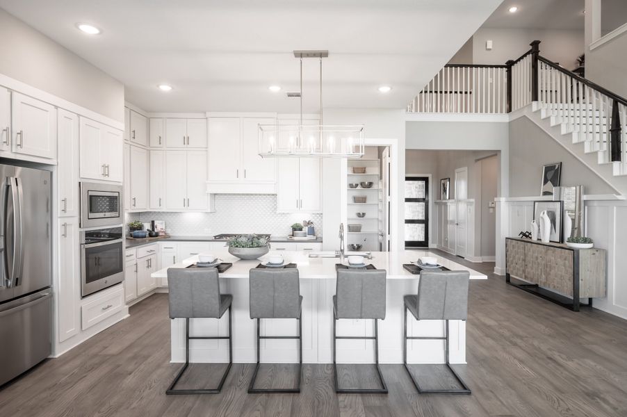 Representative furnished interior of a home built from the Barnhart by Tri Pointe Homes in Dunham Pointe, Cypress (Image 10).