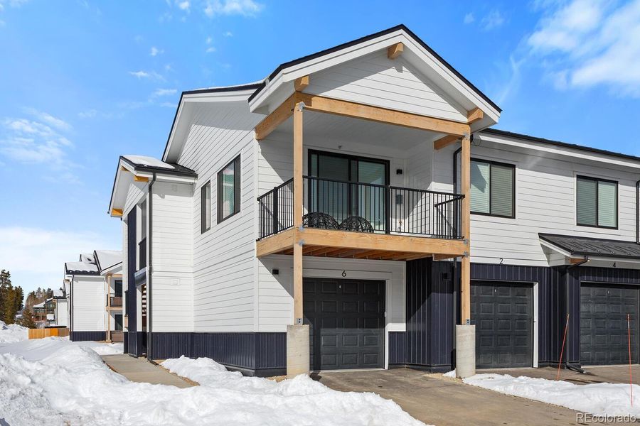 Front exterior of a new home in , Fraser, CO, highlighting curb appeal (Image 25).