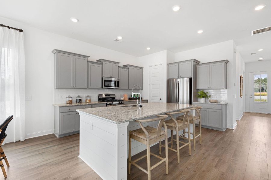 Furnished interior view inside a new home in Sweetgrass at Summers Corner, Summerville (Image 5).