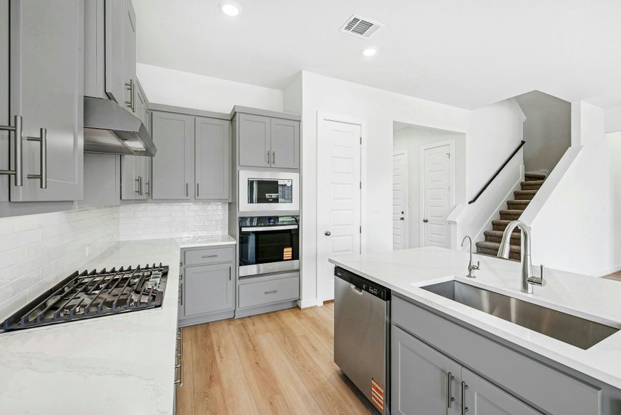 Furnished interior view inside a new home in The Colony, Bastrop (Image 9). Furnished interior view inside a new home in The Colony, Bastrop (Image 9).