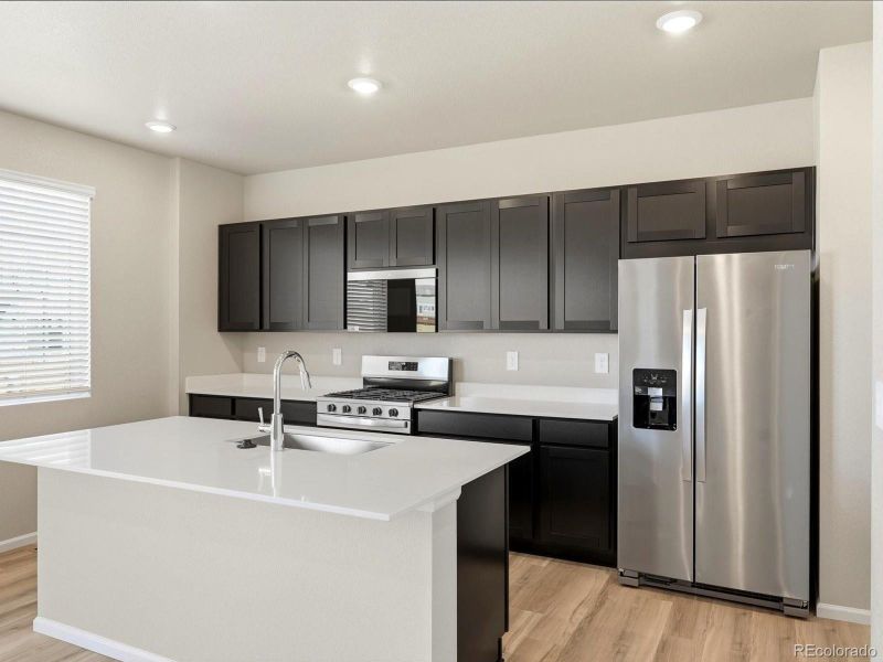 Furnished interior view inside a new home in Buffalo Highlands: The Flora Collection, Commerce City (Image 12).