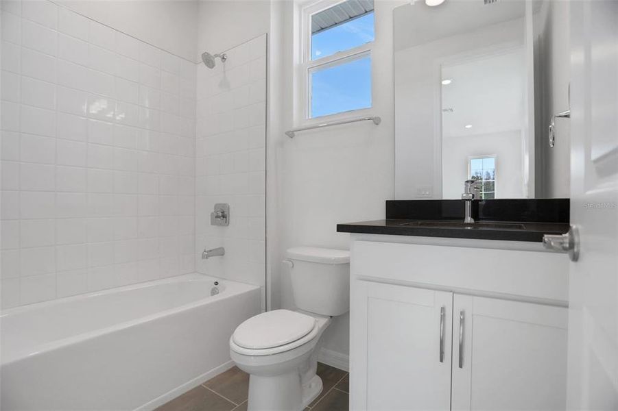 Furnished interior view inside a new home in Angeline, Land O' Lakes (Image 17).