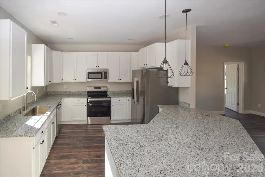 Furnished interior view inside a new home in , Hickory (Image 4).