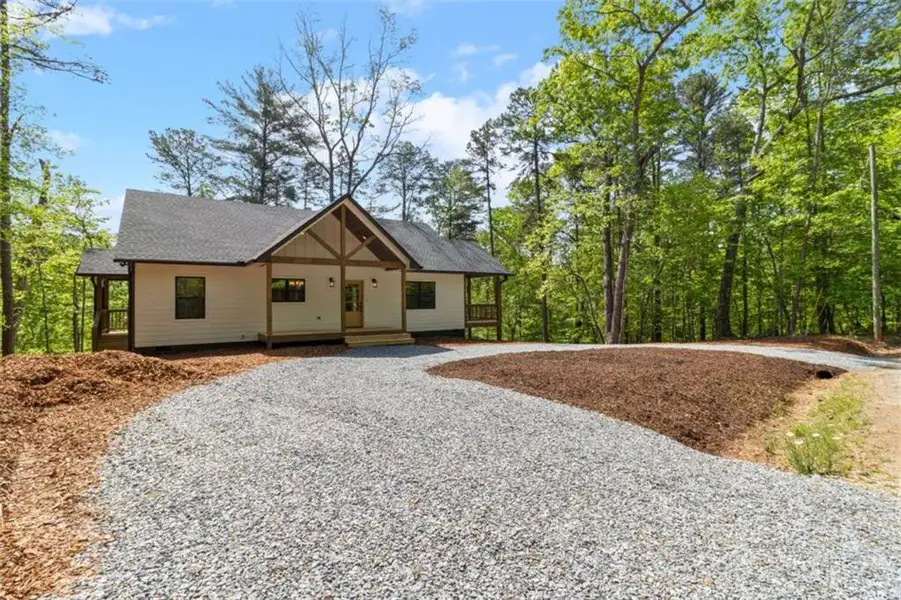Front exterior of a new home in , Ellijay, GA, highlighting curb appeal (Image 25).