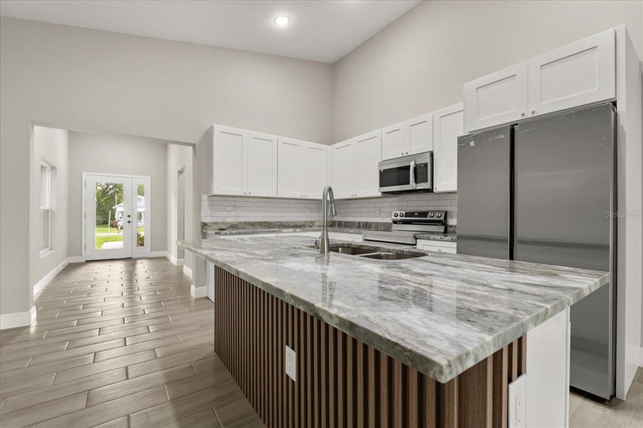 Furnished interior view inside a new home in , Lake Alfred (Image 3).