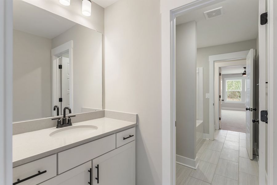 Representative furnished interior of a home built from the Bowman by Hunter Quinn Homes in Landing at Clemson Marina, Seneca (Image 8).