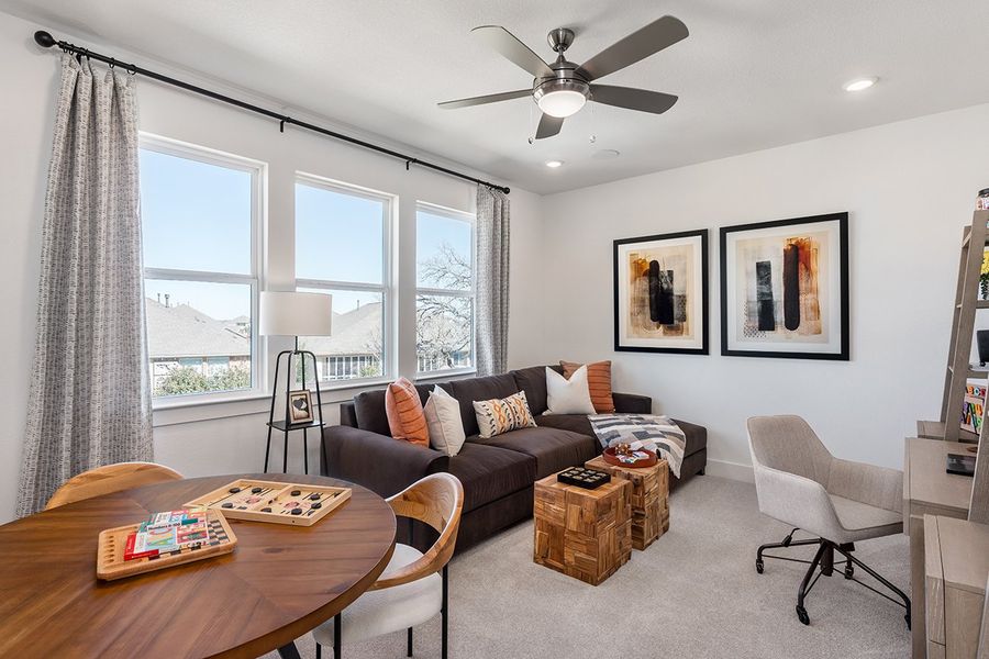Representative furnished interior of a home built from the Ametrine by Taylor Morrison in Parkside on the River, Georgetown (Image 17).