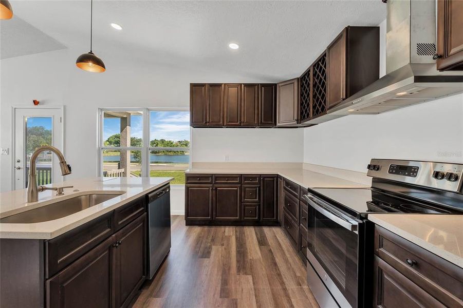 Kitchen w/ Island & Stainless Appliances