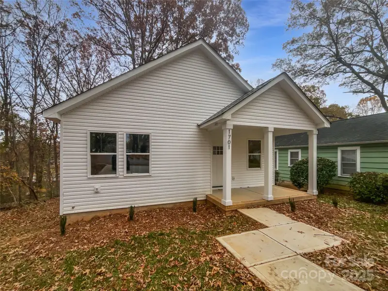 Exterior details and patio area of a home in , Statesville (Image 1).