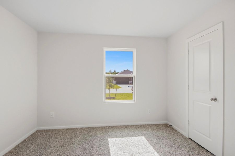 Spacious, unfurnished interior of a new home in The Canopies, Splendora (Image 9).