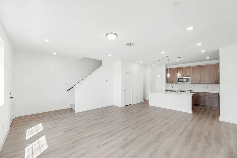 Open Kitchen-Living-Dining Room featuring the Roosevelt Collection