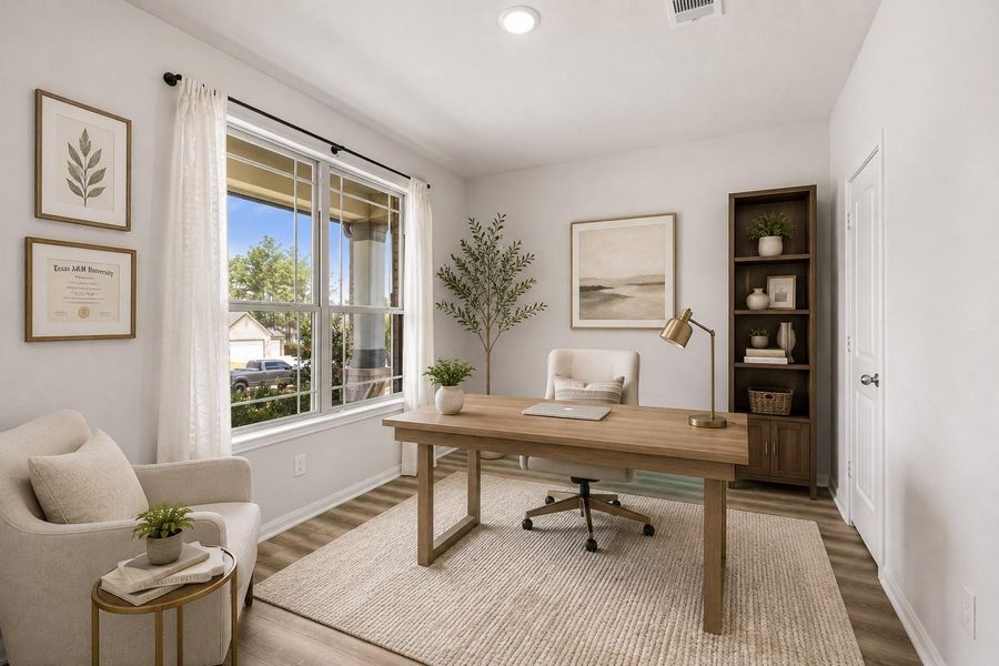 This bright and inviting 1st floor room can be a 3rd bedroom down OR an office! You can see the closet door here. *Virtually staged