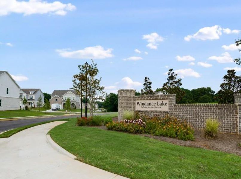 Front exterior of a new home in Windance Lake, Loganville, GA, highlighting curb appeal (Image 2). Front exterior of a new home in Windance Lake, Loganville, GA, highlighting curb appeal (Image 2).