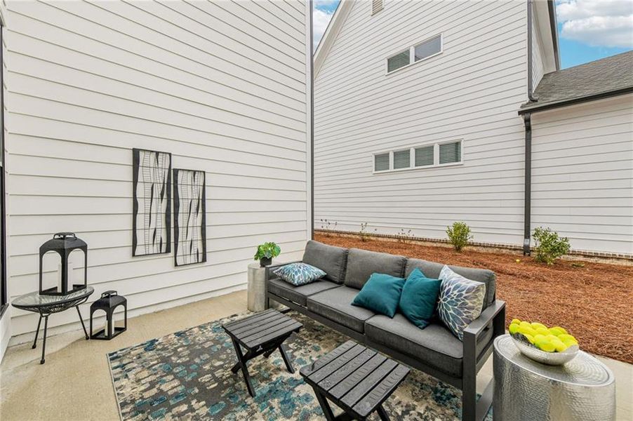 Exterior details and patio area of a home in Promenade at Sawnee Village, Cumming (Image 4).