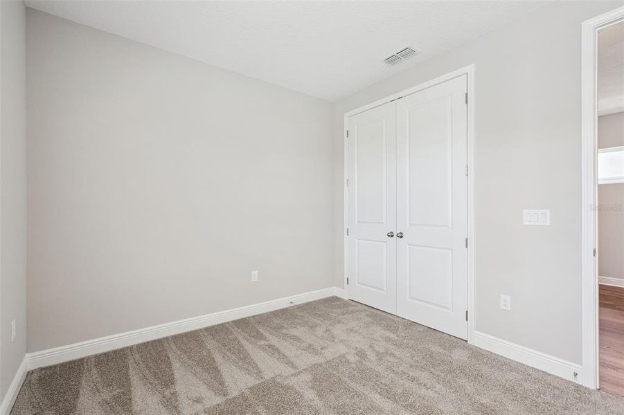 Spacious, unfurnished interior of a new home in Laureate Park, Orlando (Image 58).