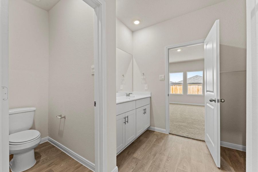 Furnished interior view inside a new home in Whisper South, San Marcos (Image 9).