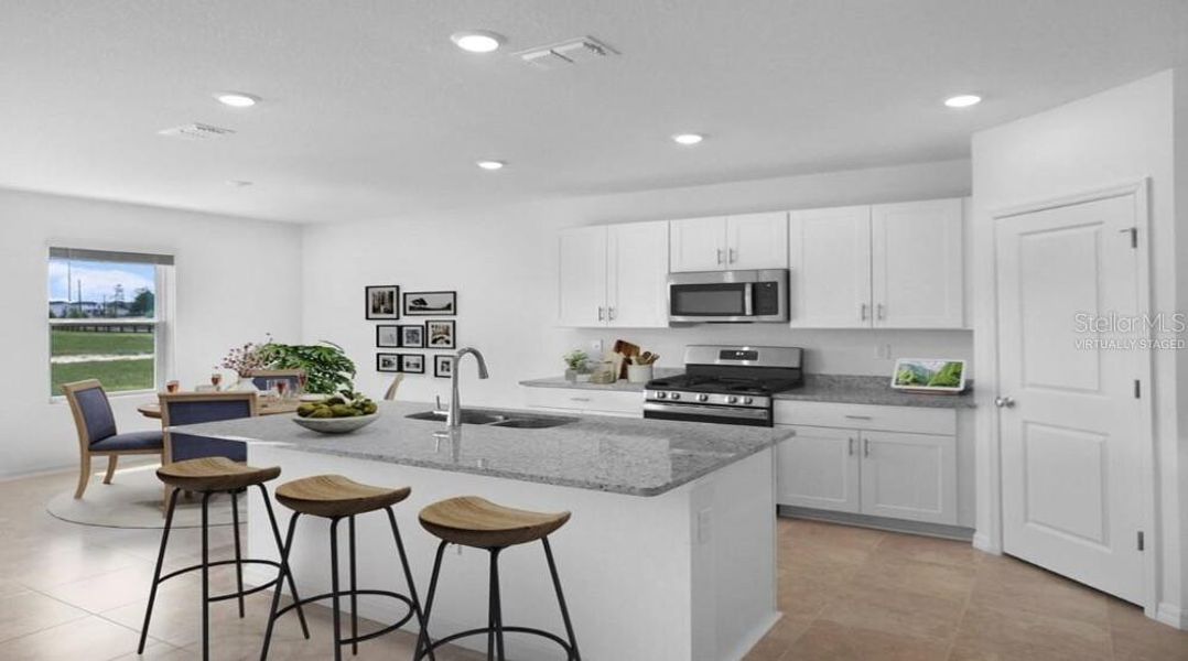 Furnished interior view inside a new home in Waterstone, Groveland (Image 12). Furnished interior view inside a new home in Waterstone, Groveland (Image 12).